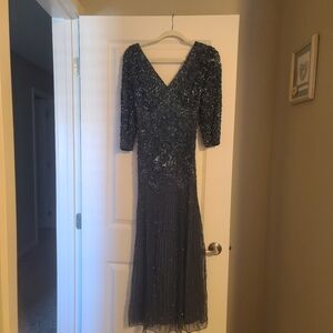Pissaro Nights long blue beaded dress. Size 10.  The beads work is amazing!
